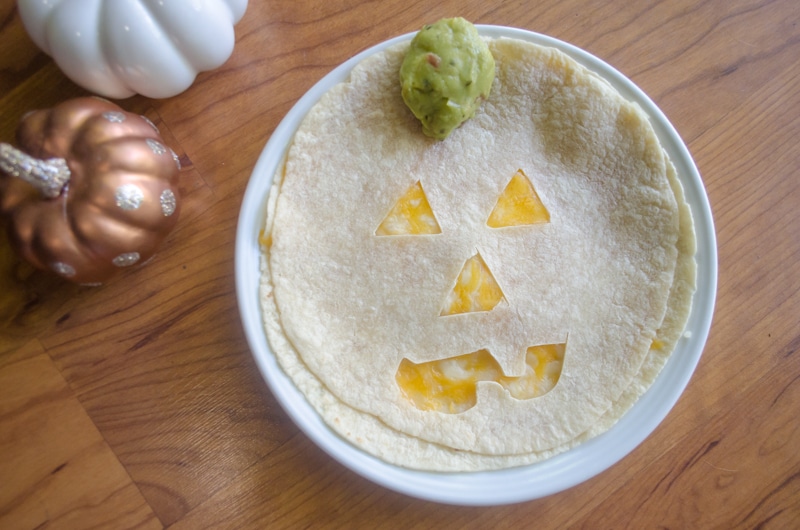 How to make a fun Halloween Jack-O-Lantern Quesadilla Quesadillas with these easy instructions. Grab a fun Halloween dinner idea.