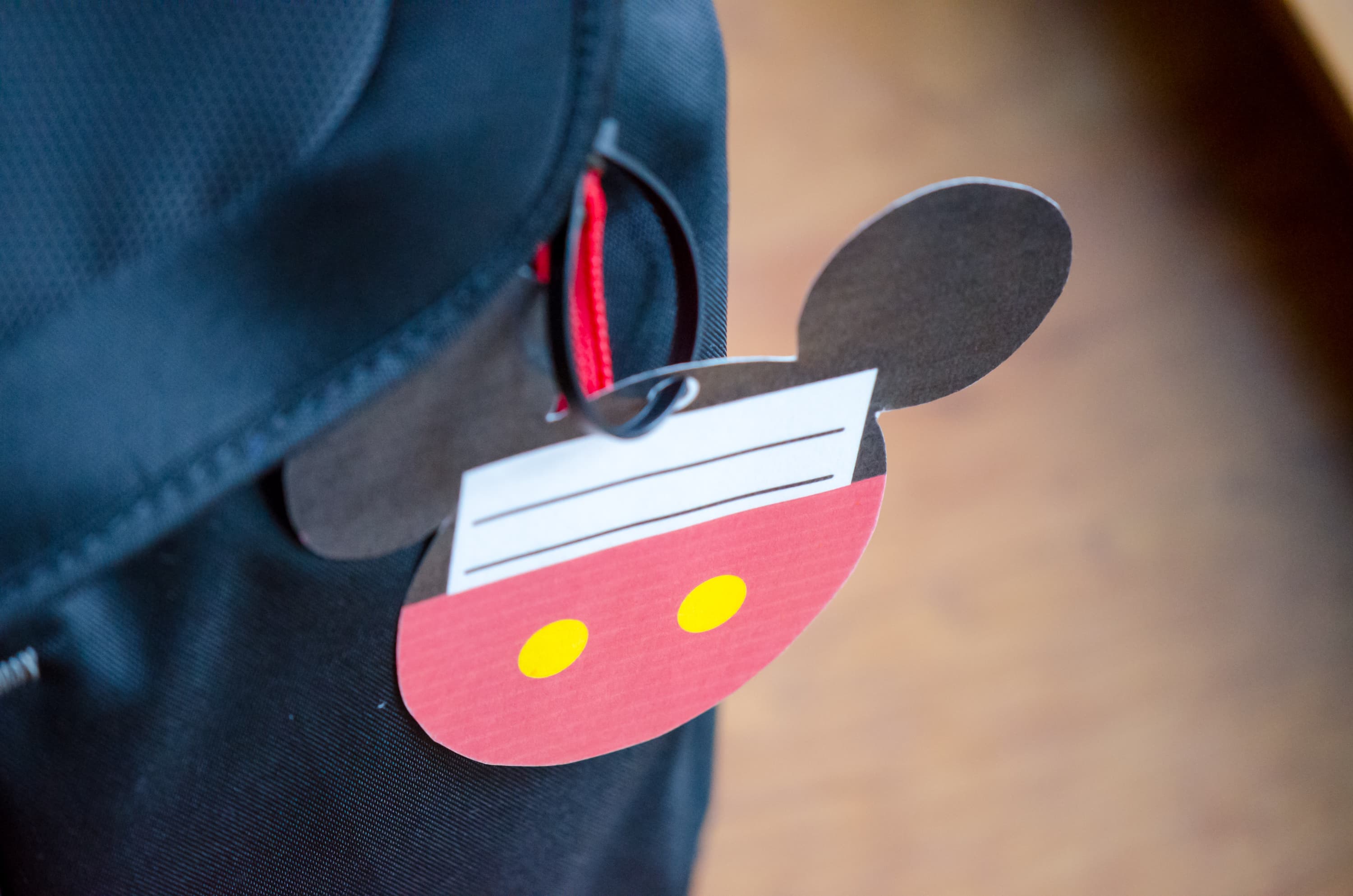 Free Printable Mickey Mouse Luggage Tags that are easy to create for your luggage on your next Disney Parks vacation.