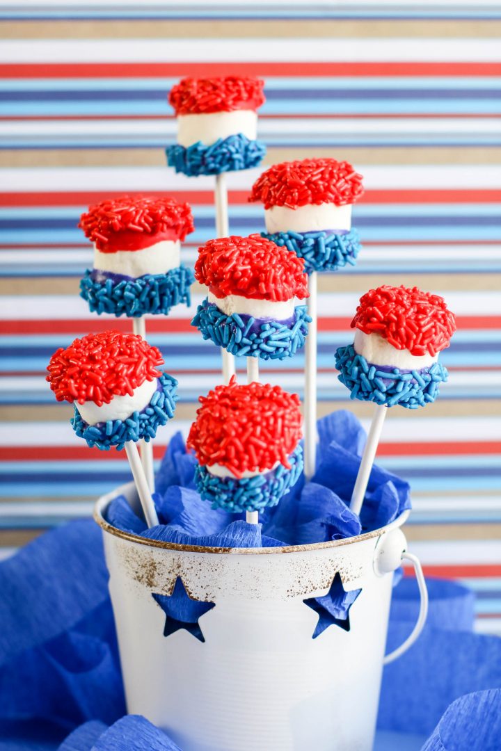 Red White and Blue Marshmallow Pops in bucket with stars on it
