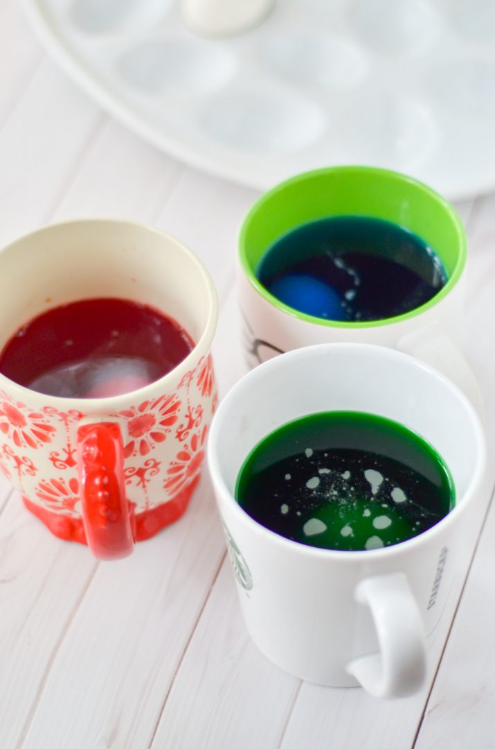 easter egg food coloring dye in mugs
